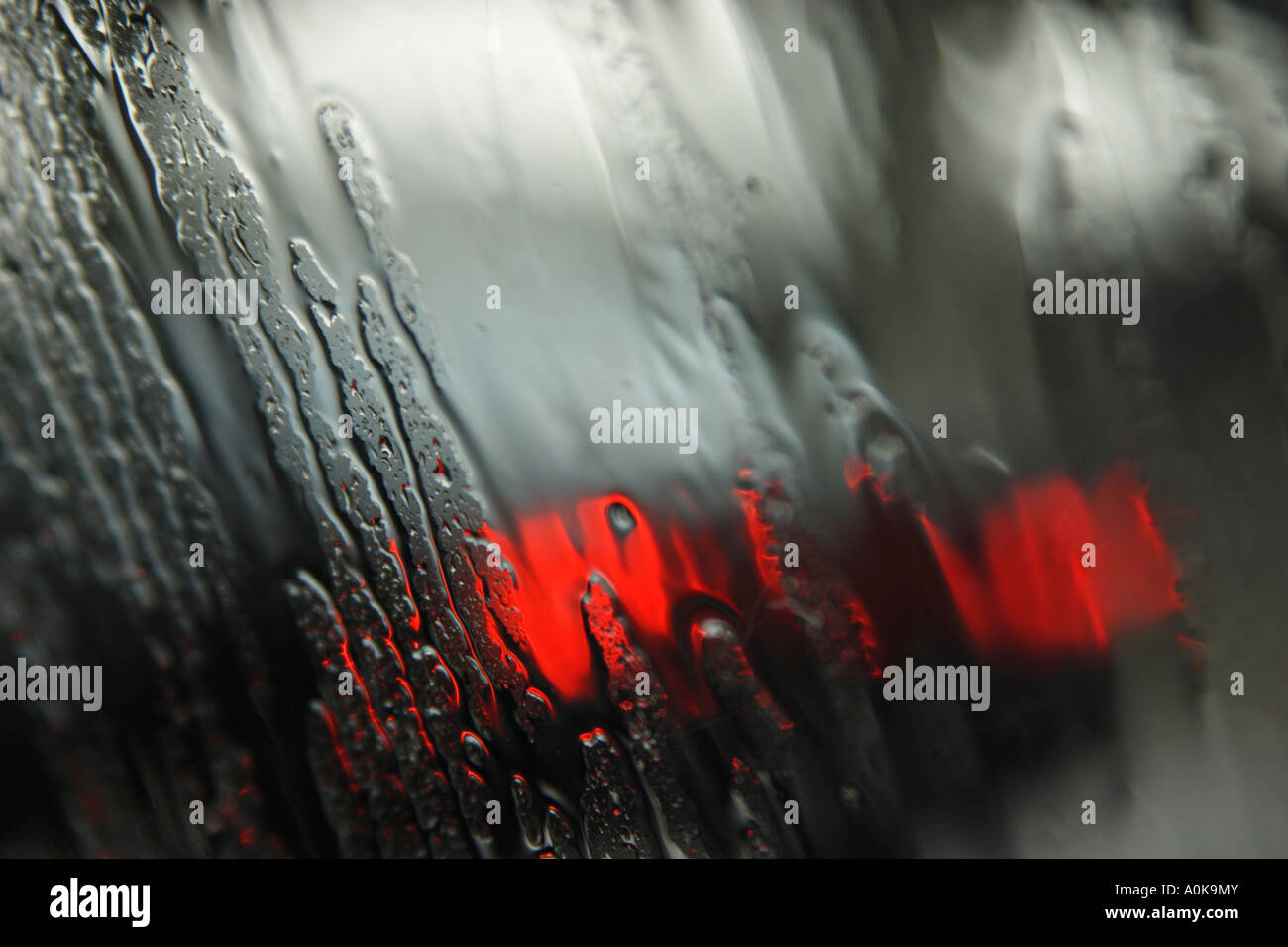 car seen through window pane on a rainy day Stock Photo Alamy