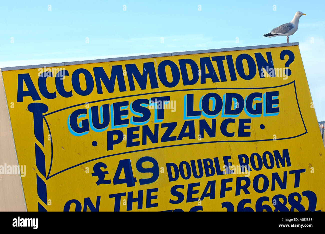 A notice advertising accommodation on the seafront at Penzance in Cornwall England UK Stock Photo
