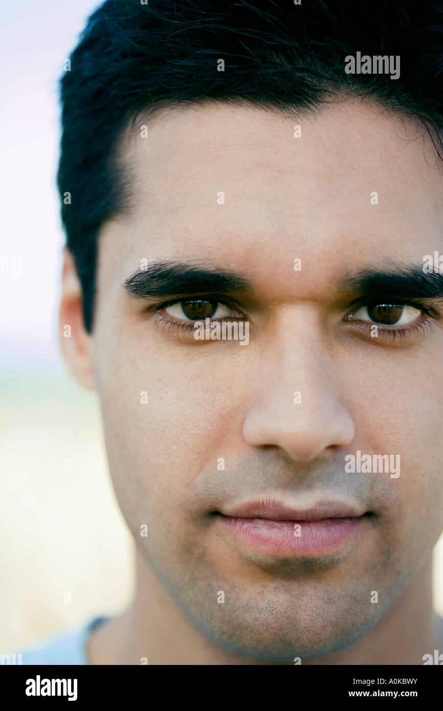 portrait of young man looking at camera Stock Photo