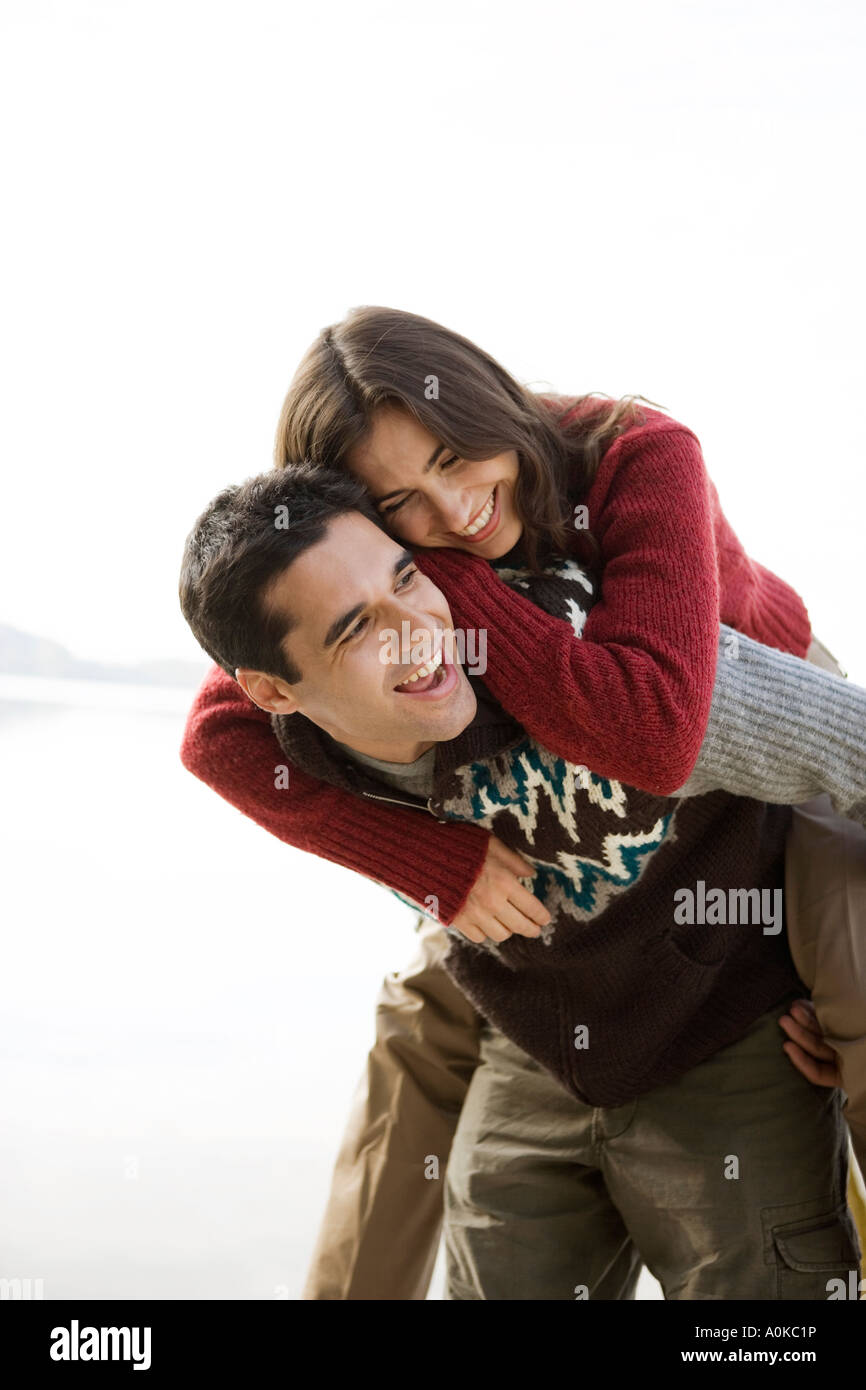 Young couple enjoying piggyback hi-res stock photography and images - Alamy