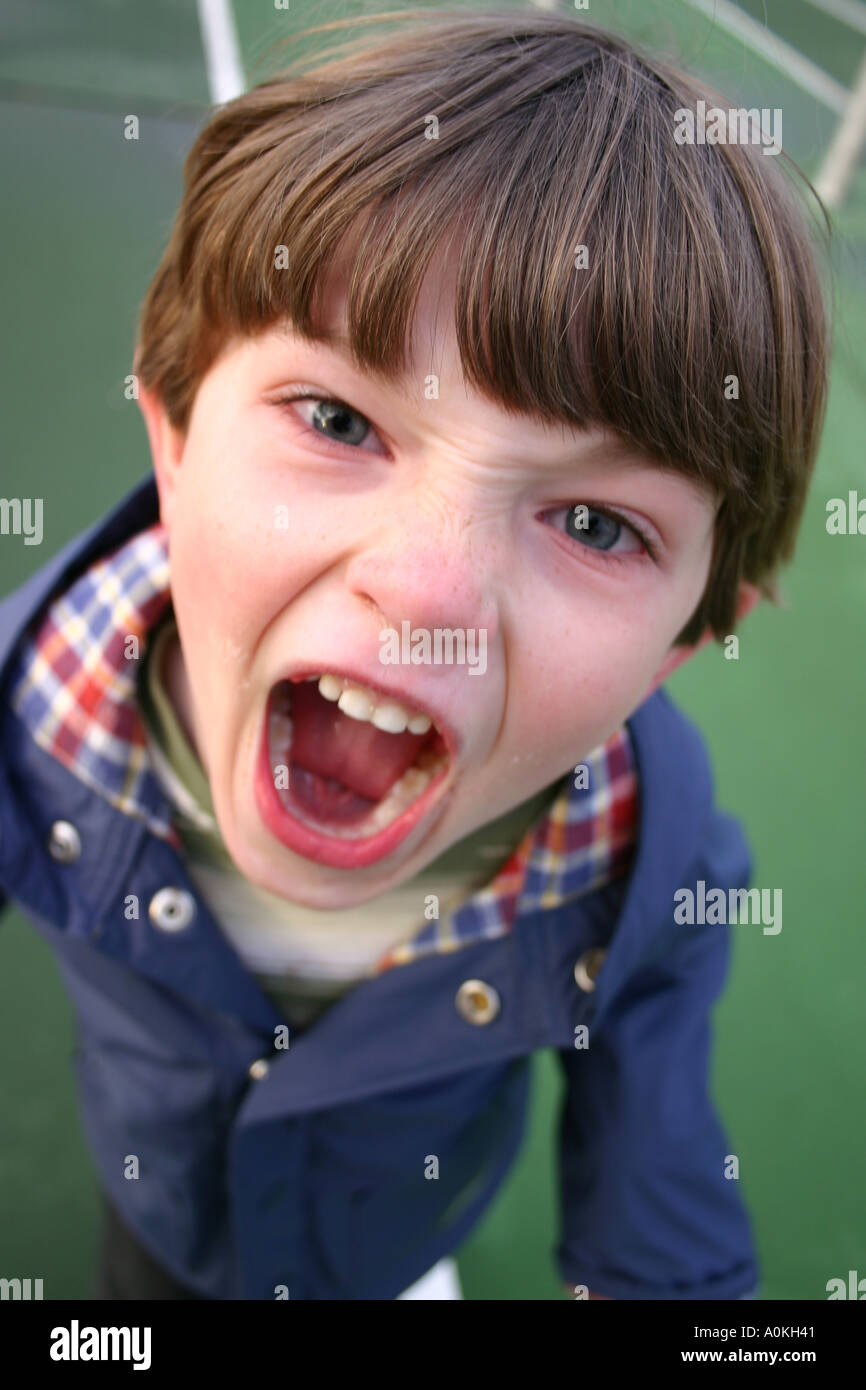 angry child yelling close up Stock Photo Alamy