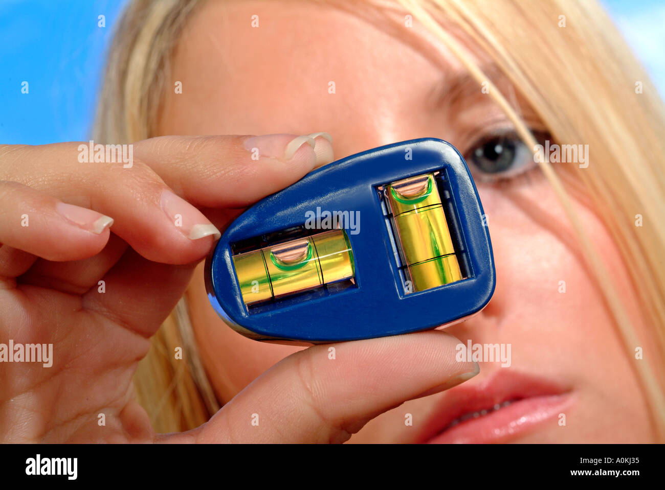 bubble level in hand Stock Photo Alamy