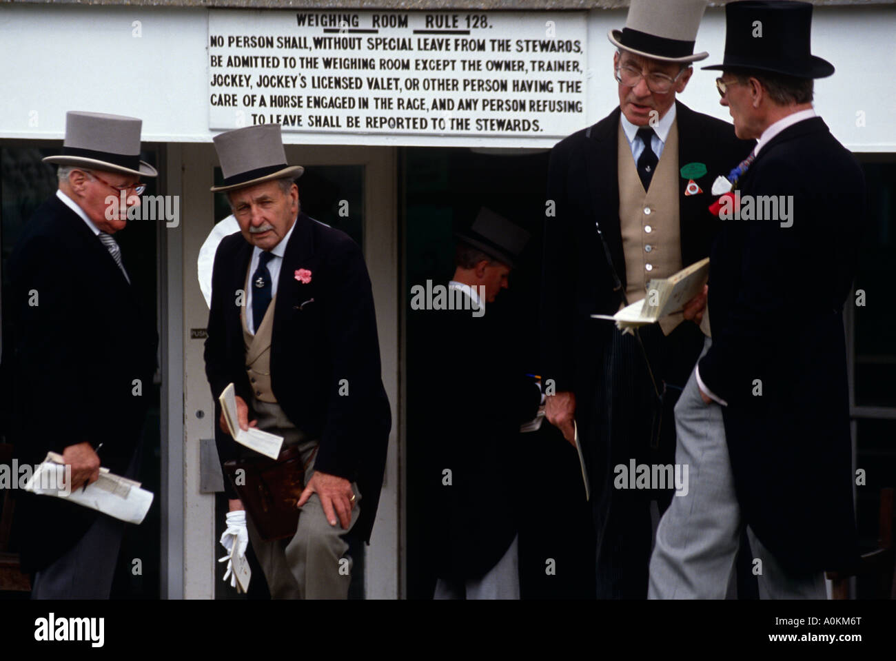 Trainers and owners outside the weighing room at Royal Ascot racecourse in Ascot, Berkshire, England Stock Photo