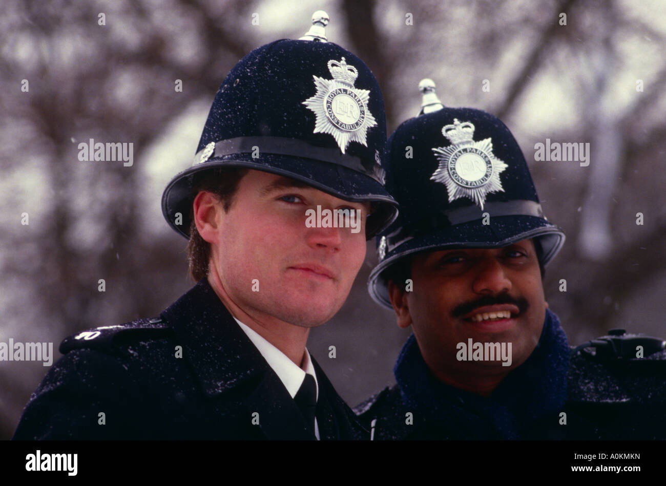 Two Metropolitan Police officers on a winters day in London, England Stock Photo