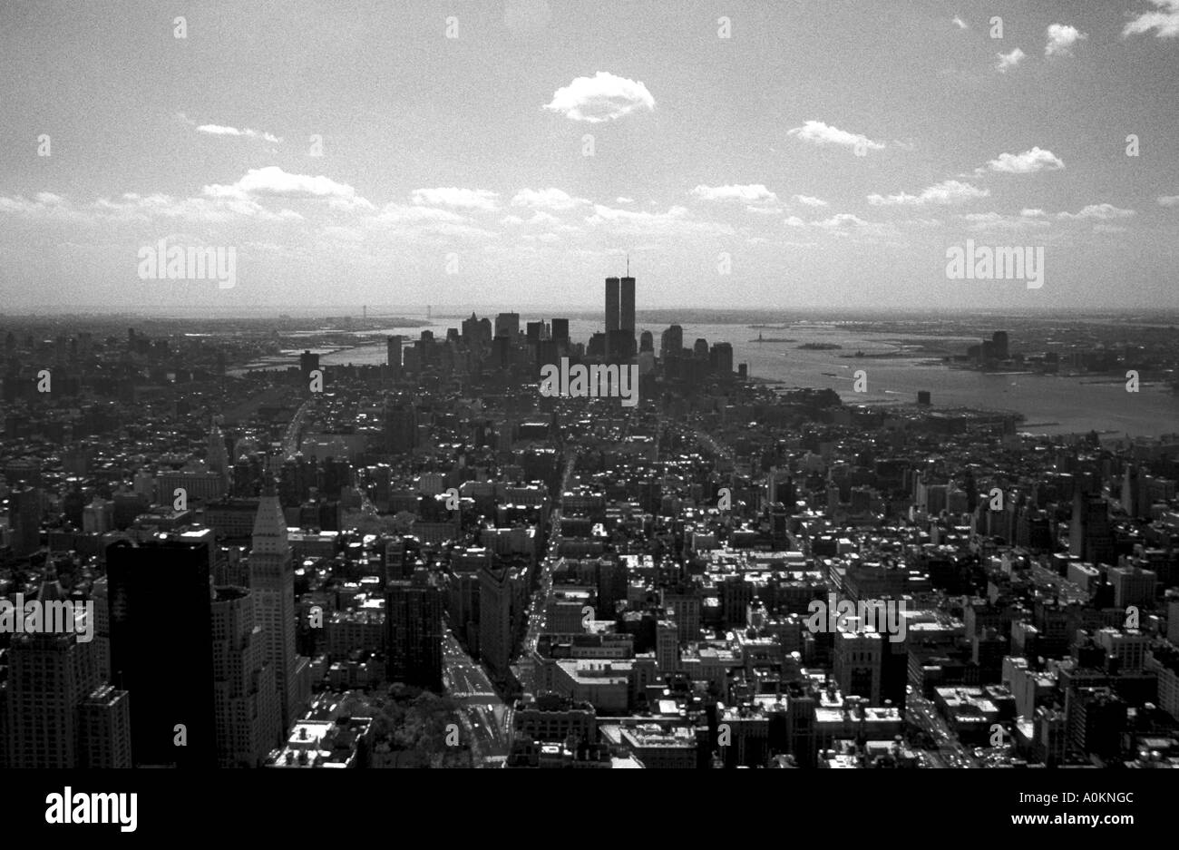 Black and white grainy image of Manhattan, New York taken from Empire state building towards the twin towers. Stock Photo