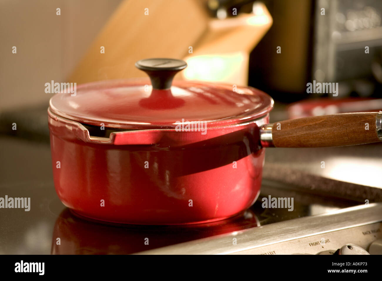 Saucepan on cooker hires stock photography and images Alamy