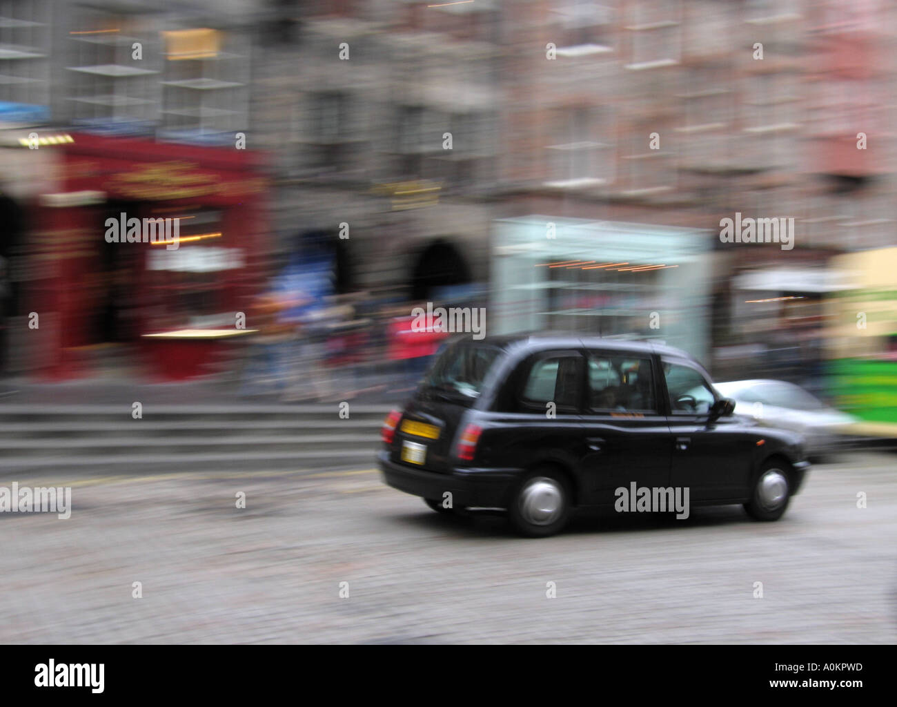 A black cab on Edinburgh's royal mile Stock Photo
