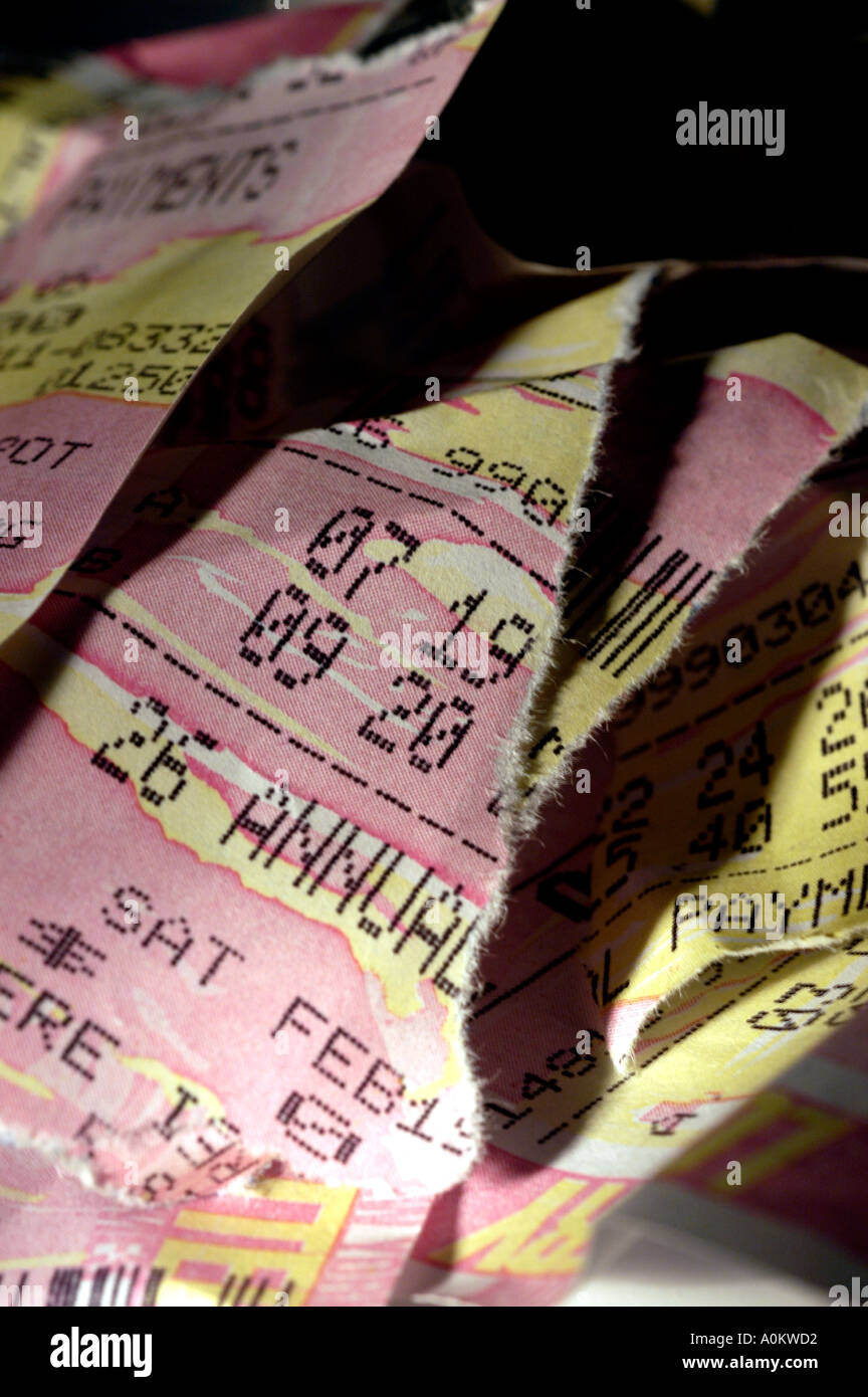 Discarded Raffle Tickets A collection of torn up and discarded New York State Lottery tickets ...
