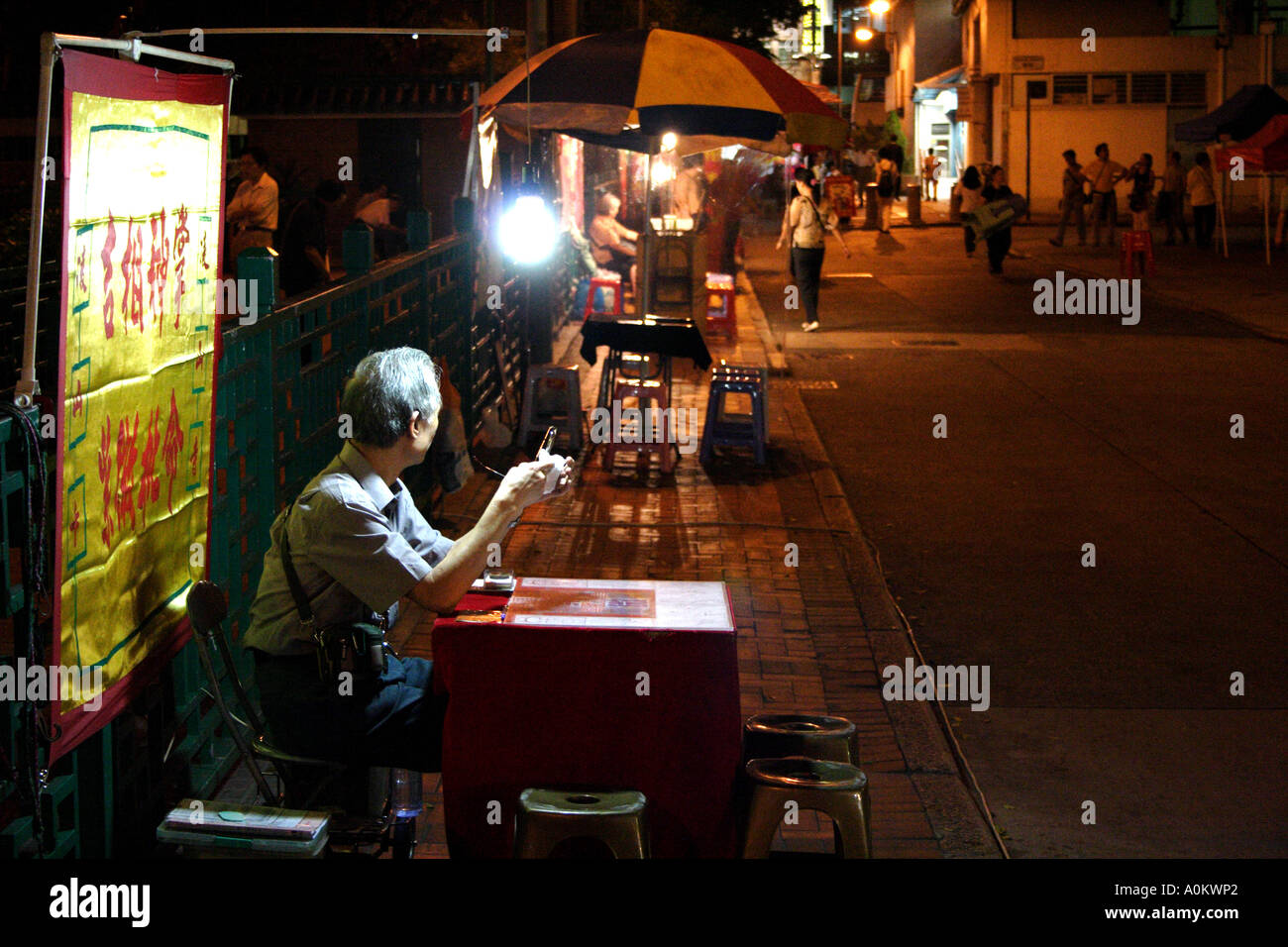 Fortune teller on Temple street in Kowloon, Hong Kong Stock Photo Alamy