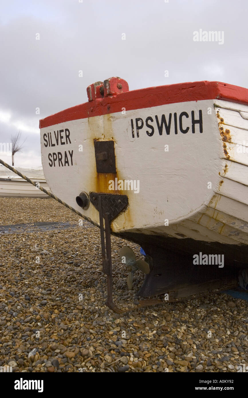 Suffolk Aldeburgh East Anglia fishing boat on shingle beach rudder Stock Photo