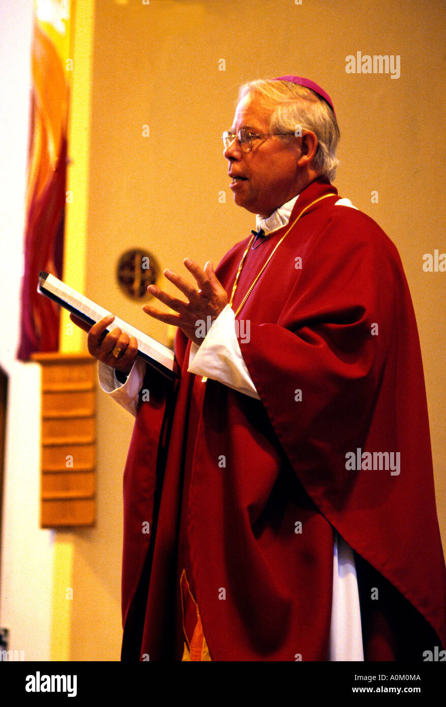 Mass at Pentecost Bishop Reading at St Josephs Church Stock Photo