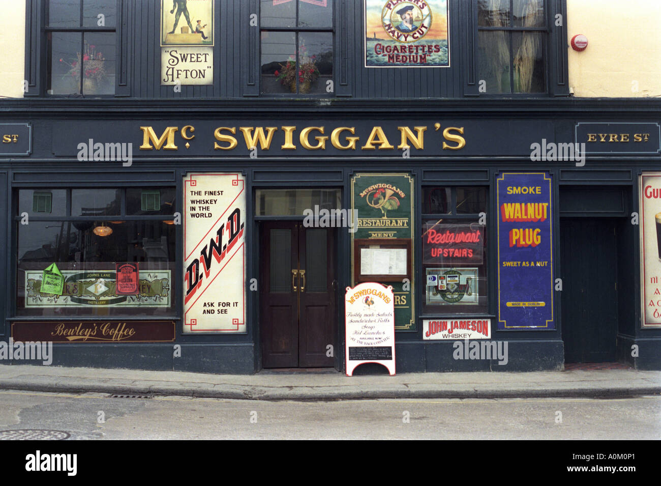 McSwiggans pub in Galway, Ireland, prior to the removal of tobacco advertising. Stock Photo