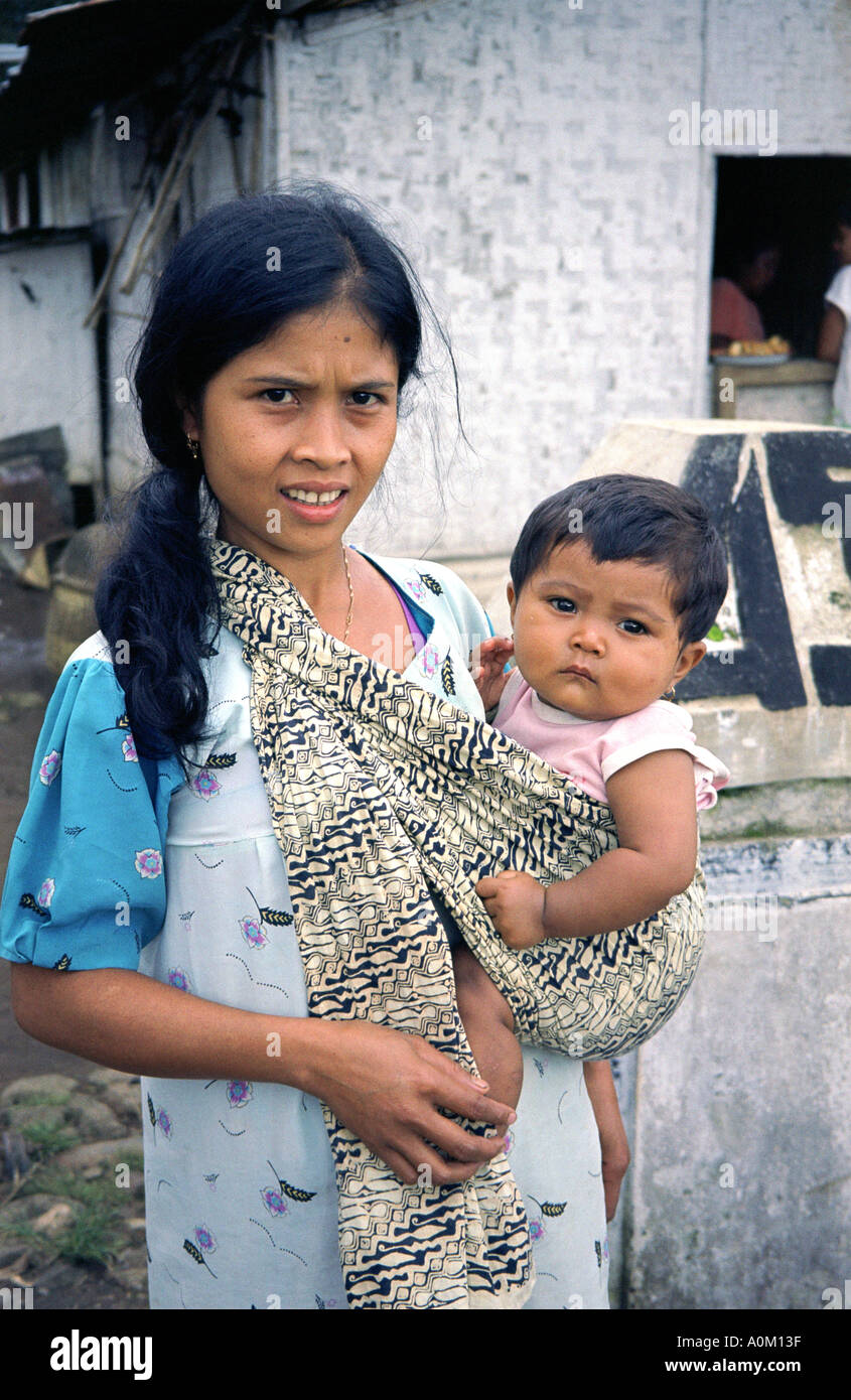 Javanese mother and child in Kaliklatak plantation near Banyuwangi and ...