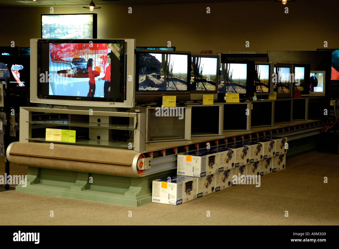 Television sets lined up in display. Fry's electronics store CALIFORNIA Stock Photo