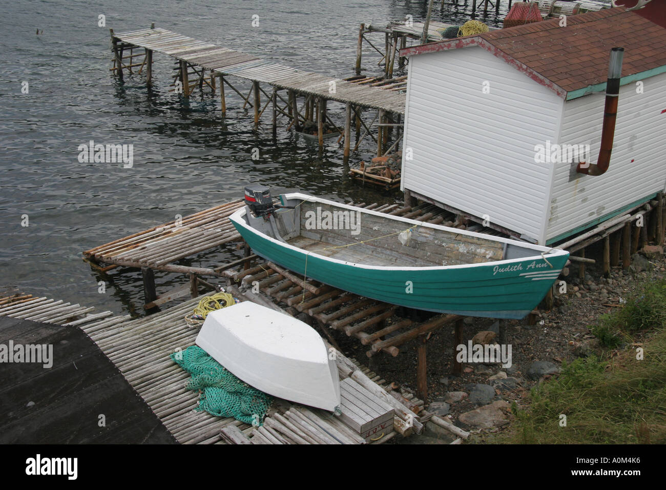Stages Stores skiffs and Piers at Harbour Breton Newfoundland Stock