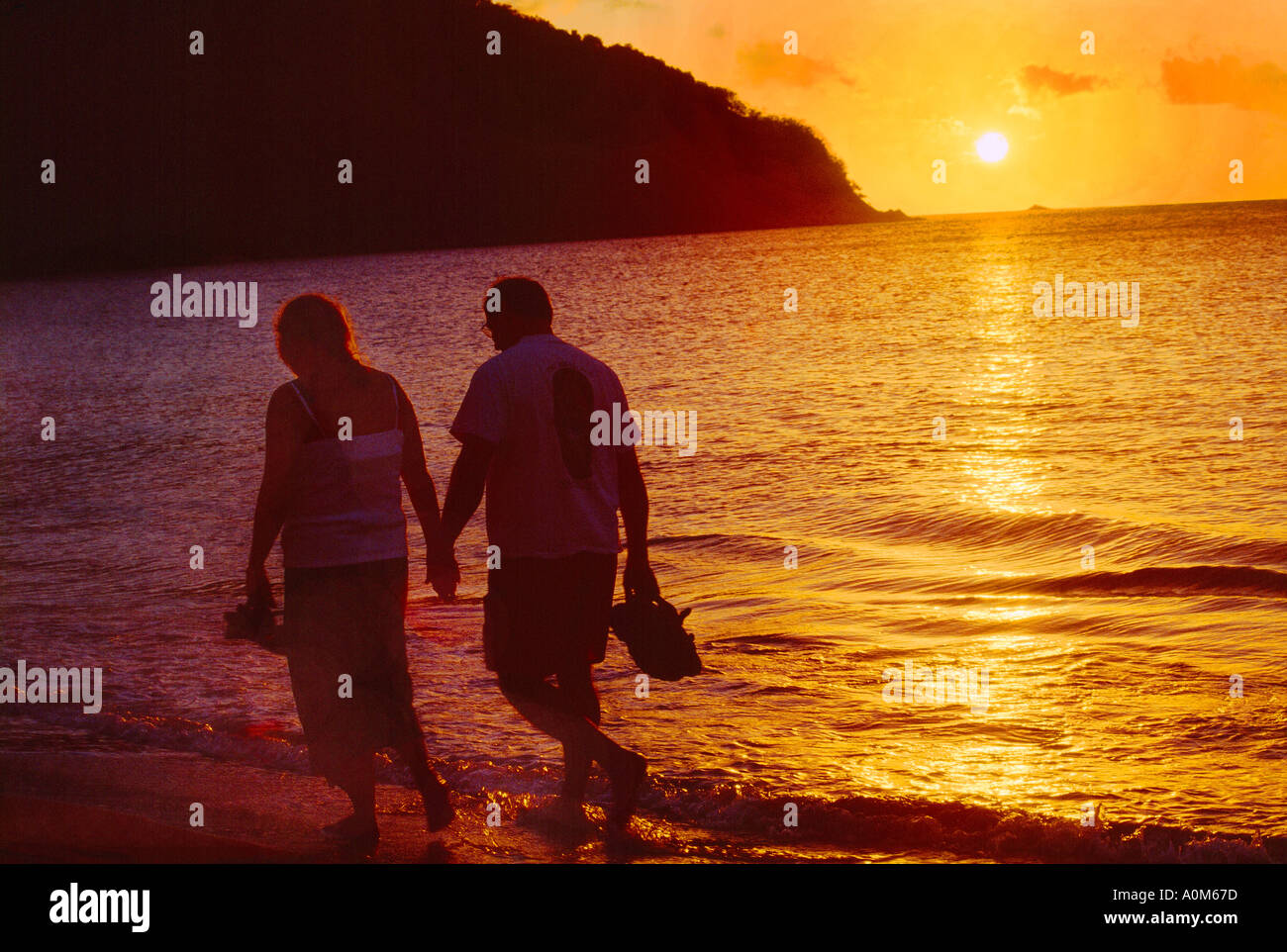 Couple holiday romance hand in hand hi-res stock photography and images ...