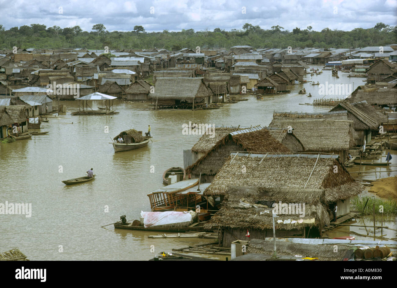 Peru1970 floating town of Belen Iquitos amazon river Loreto department consisting wood and palm leaved huts on stilts and rafts Stock Photo