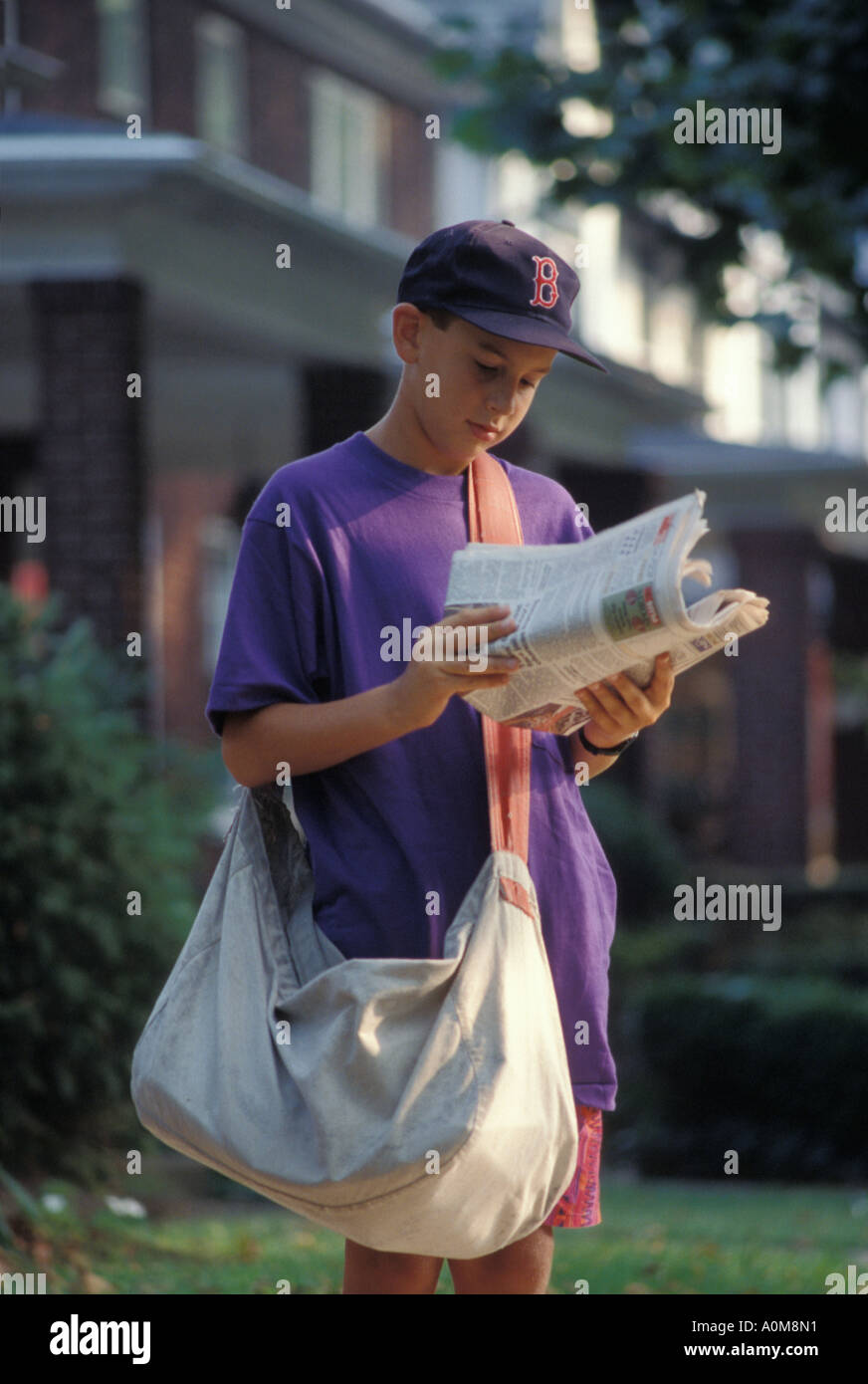 newspaper delivery boy USA PA Pennsylvania walking newsboy carrier Stock Photo 5728848 Alamy