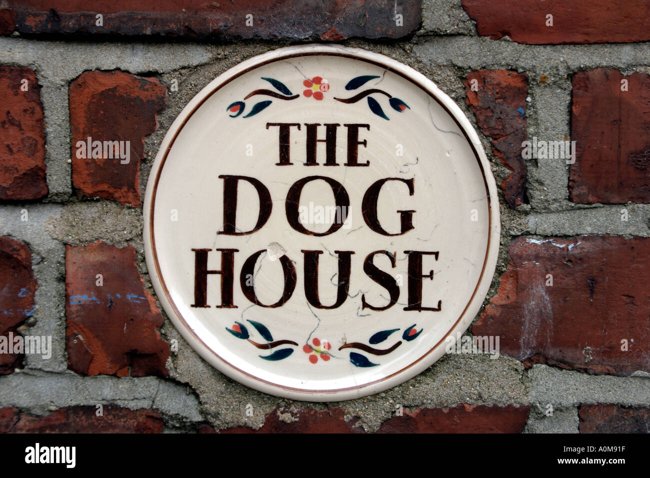 The Dog House Plaque on house wall Stock Photo Alamy
