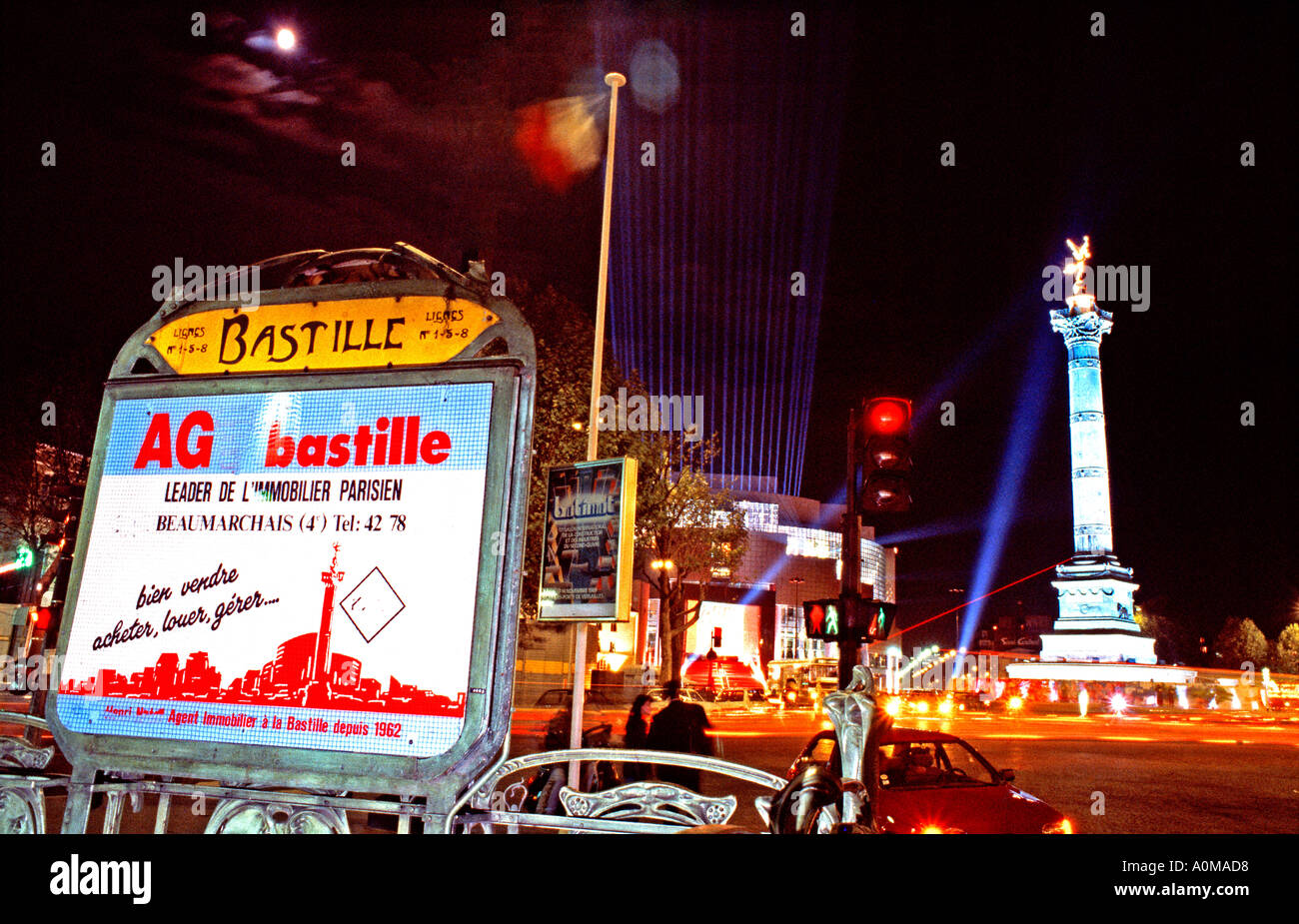 Paris France, Paris Metro Entrance  Monument July Column on 'Place de la Bastille' Outdoor Advertising Sign Lights, at Night Stock Photo