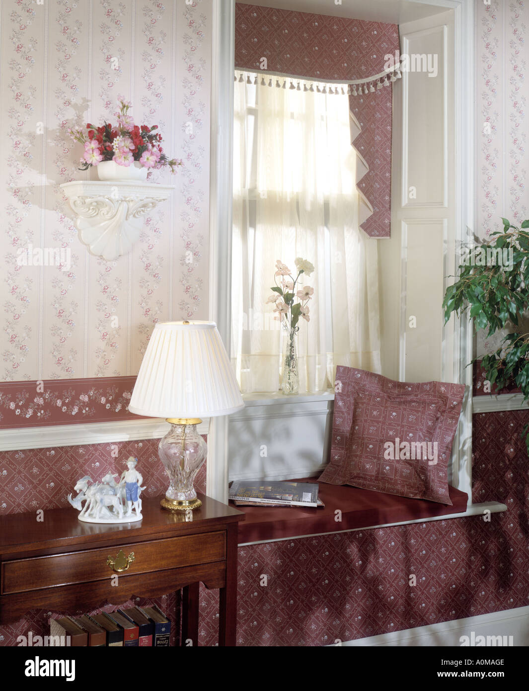 room interior wallpaper window seating alcove window seat alcove lace  curtain pillow lamp table nick nack bric a brac Stock Photo - Alamy