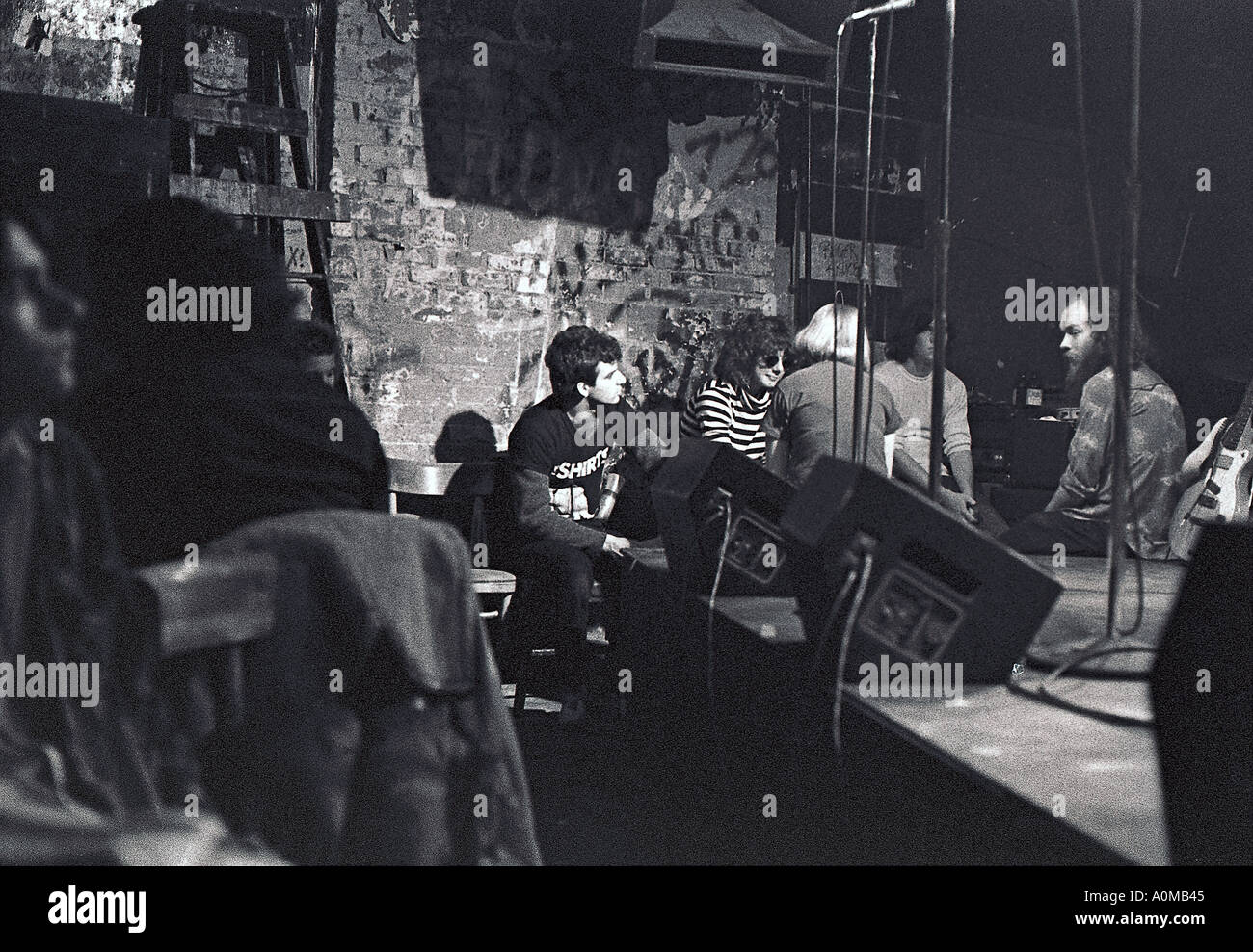 New York, NY, USA, Small Crowd Young People, 'CBGBs Nightclub' Interior Scene with Owner Relaxing Near Stage, punk nightclub 1970s Stock Photo