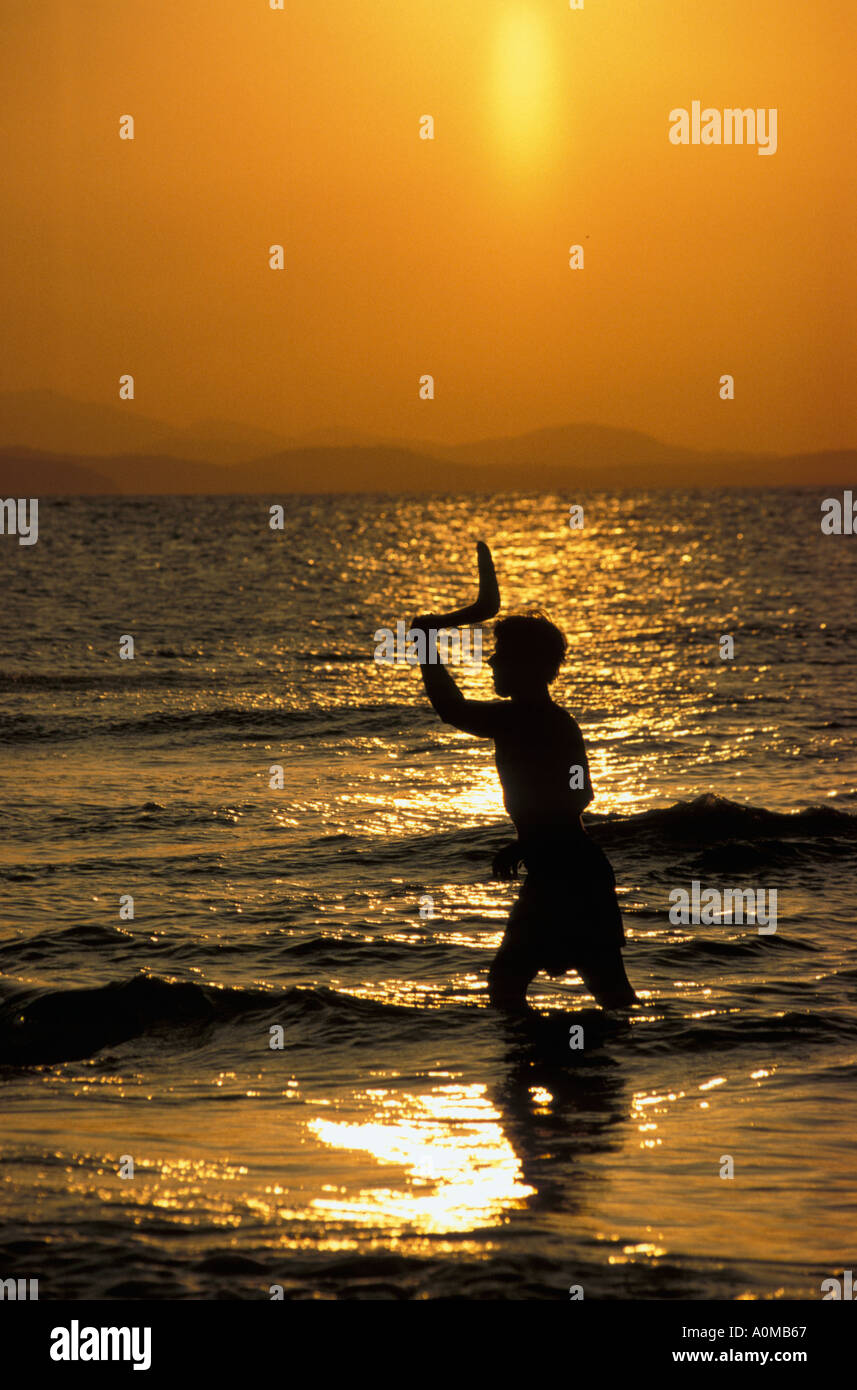 Australia Queensland Great Keppel Island man throwing boomerang Stock