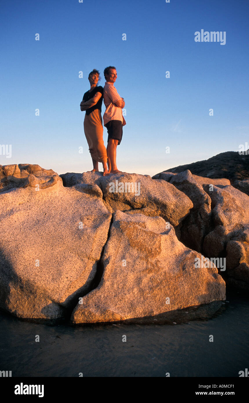 Australia Queensland Lizard Is couple posing on rocks Stock Photo