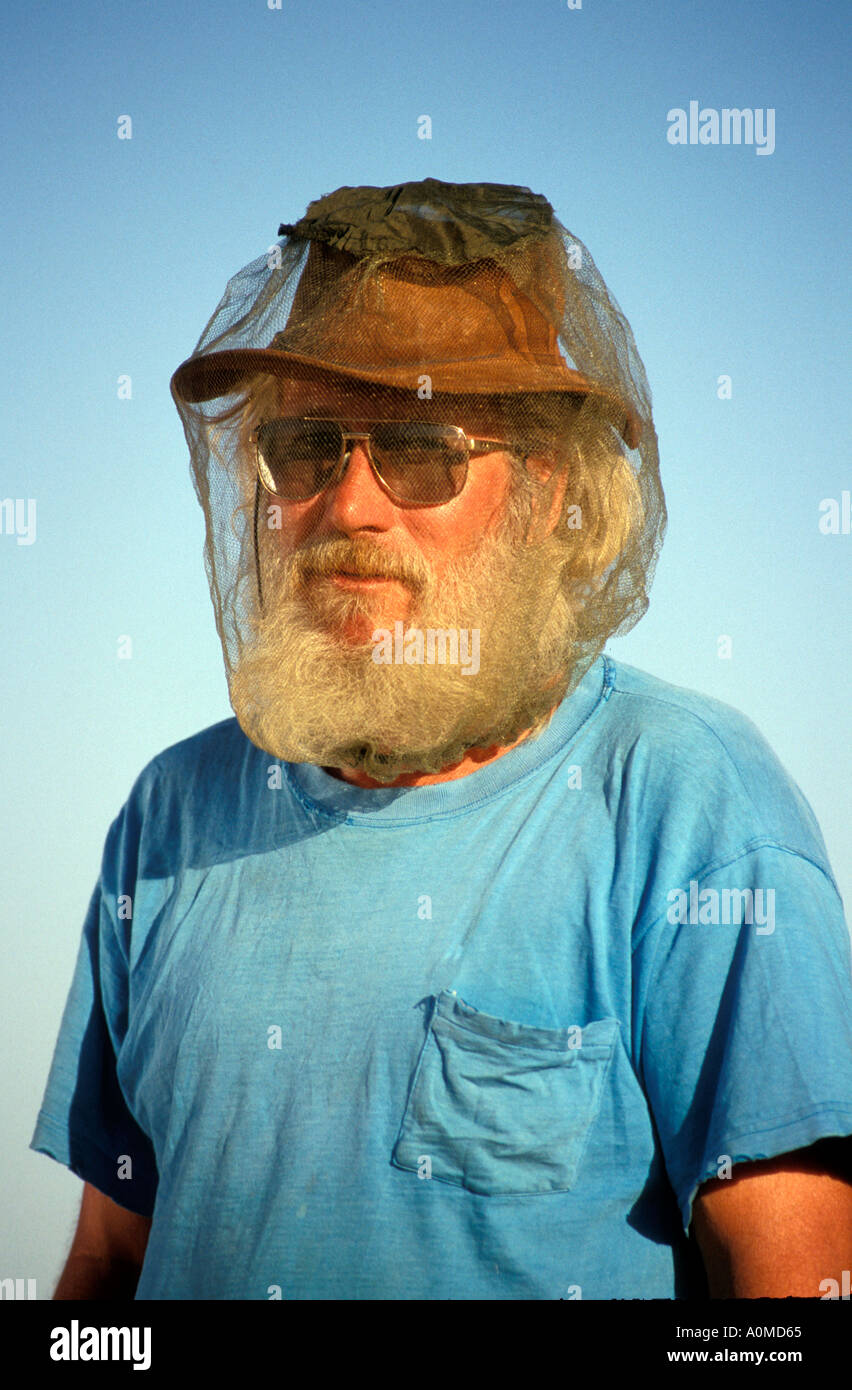 Australia Simpson Desert aussie man wearing fly net over hat Stock