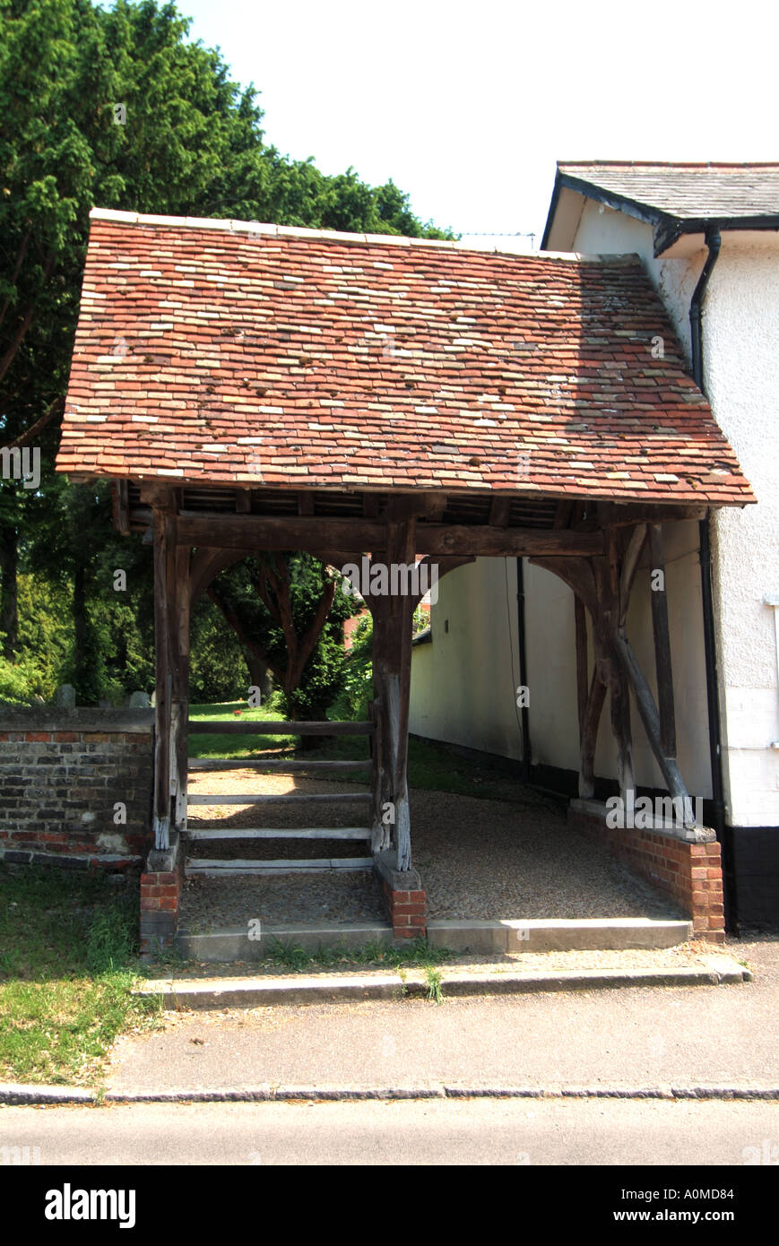 Ashwell village lychgate roofed gateway to the churchyard formerly used as a temporary shelter for the bier during funerals Stock Photo