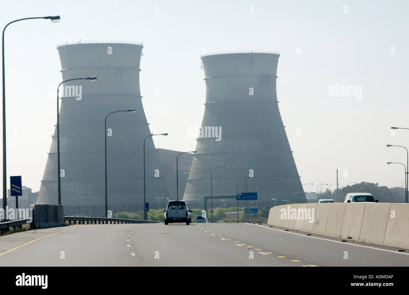 View of the Athlone Cooling Towers in Cape Town South Africa with highway in foreground Stock Photo