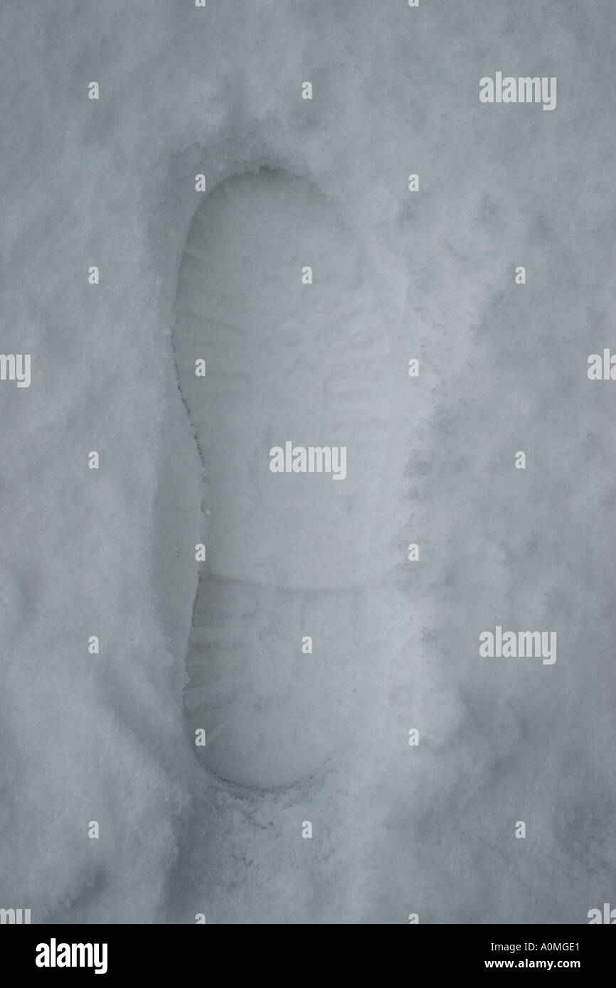 Footprint on snow Stock Photo