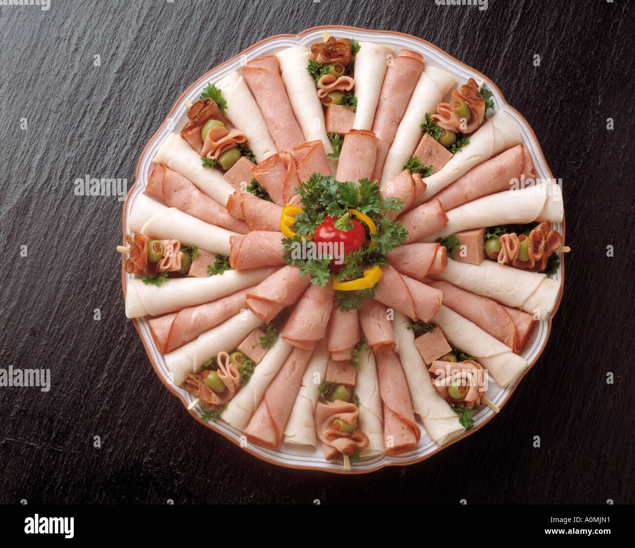 overhead view meat deli platter plate appetizer rolled ham bologna