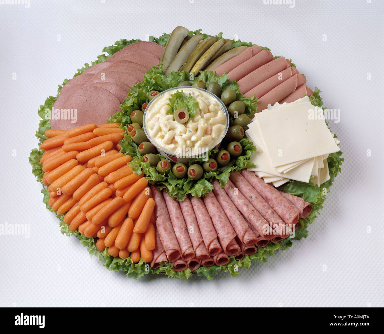 assorted appetizer platter cheese boiled ham carrot olives potato
