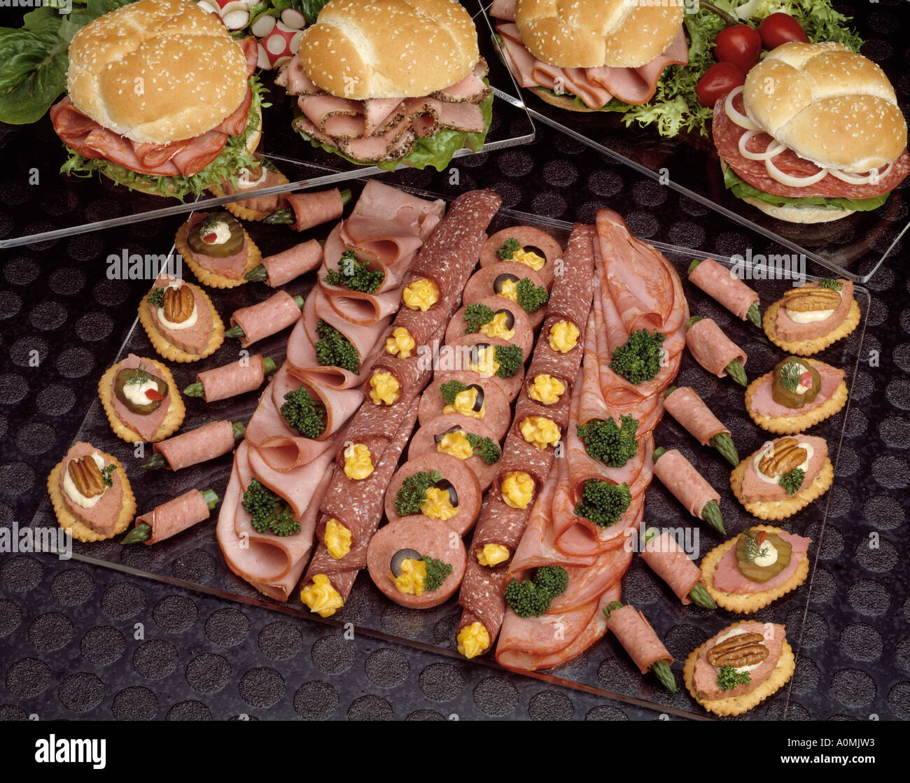 assorted assortment appetizers sandwich bologna ham salami radish cheese walnuts asparagus