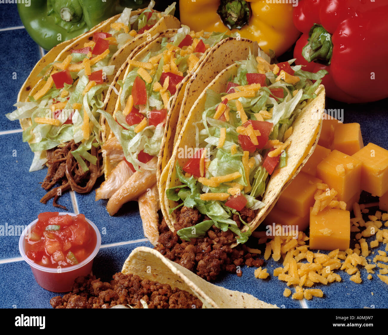 3 three hard shell tacos beef steak chicken cheese lettuce salsa tomato