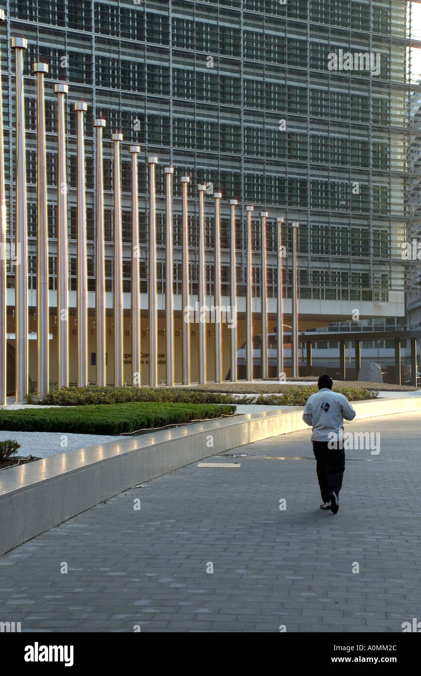man walking in front of European commonsioners building in Brussels Stock Photo