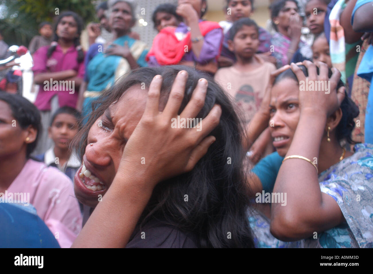 Women crying loss of husband after Tsunami earthquake Nagapattinum Velankanni Tamil Nadu India Asia Indian tragedy Stock Photo