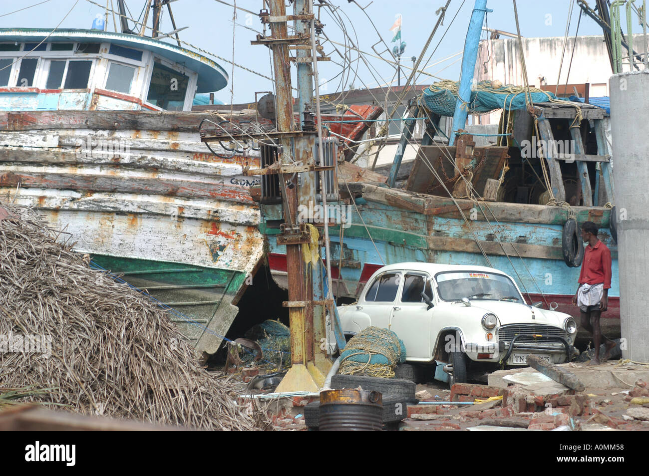 Damage to boats by natural disaster Tsunami earthquake on sea floor Nagapattinum Velankanni Tamil Nadu Indian Ocean India Asia Stock Photo