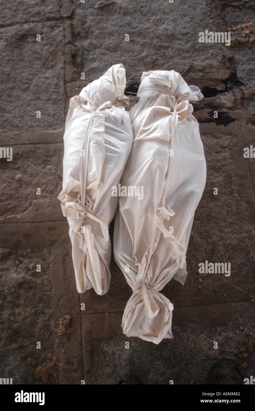 dead bodies wrapped in white cloth waiting to be identified after Tsunami earthquake Nagapattinum Velankanni Tamil Nadu India Stock Photo