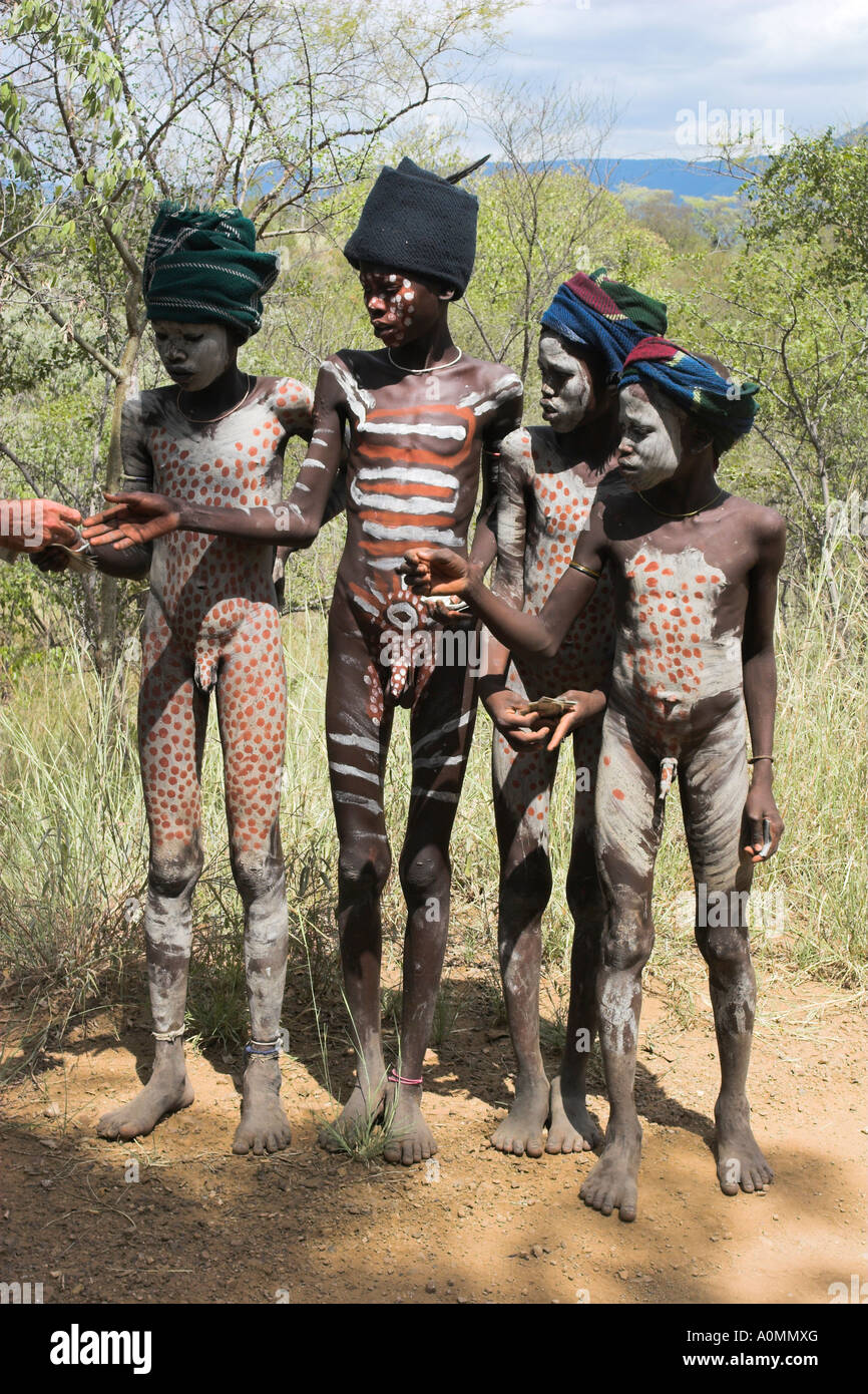 Ethiopia, south omo valley, mursi tribe, young boys with