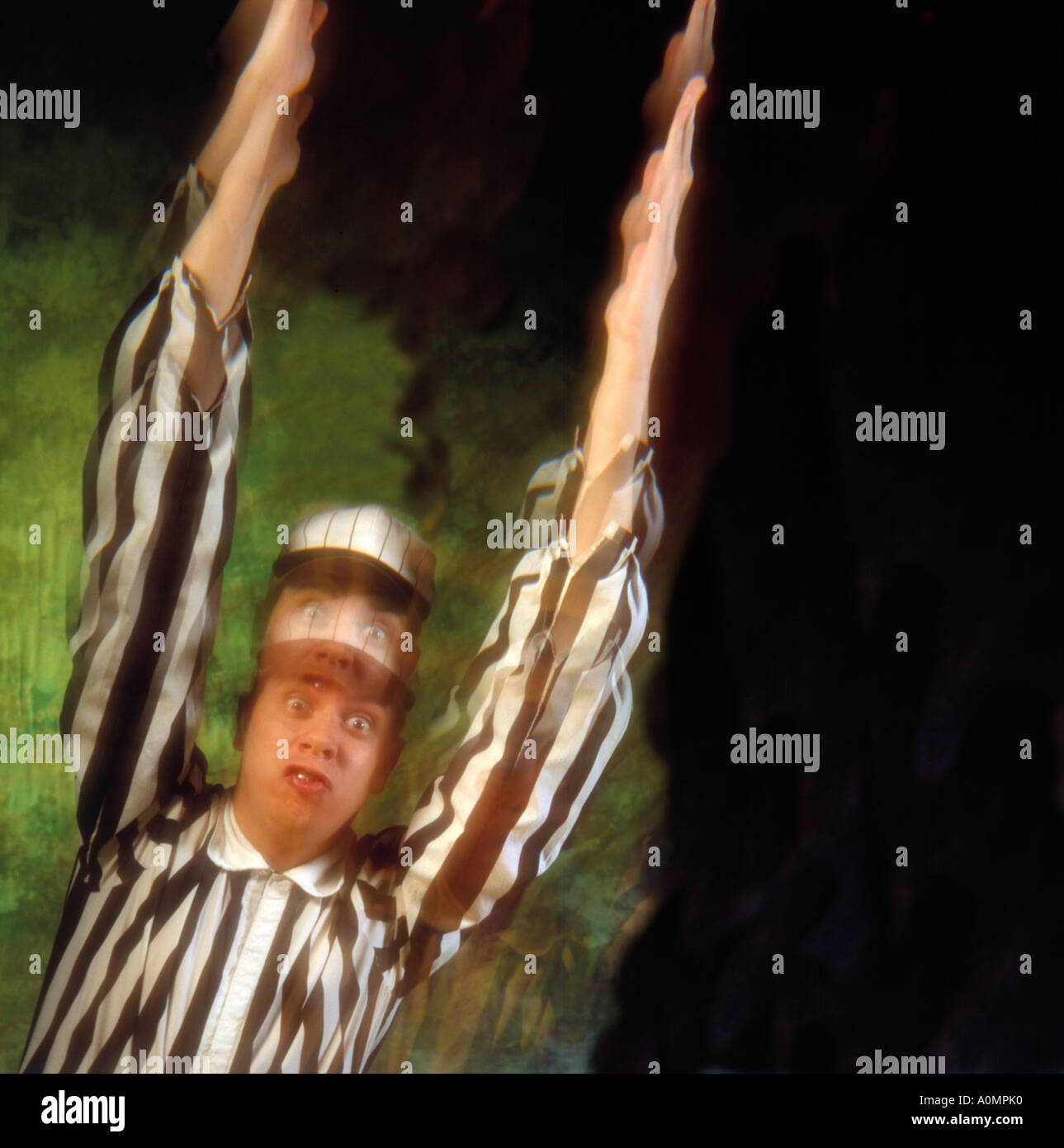 1 one male caucasian referee signals touchdown field goal american