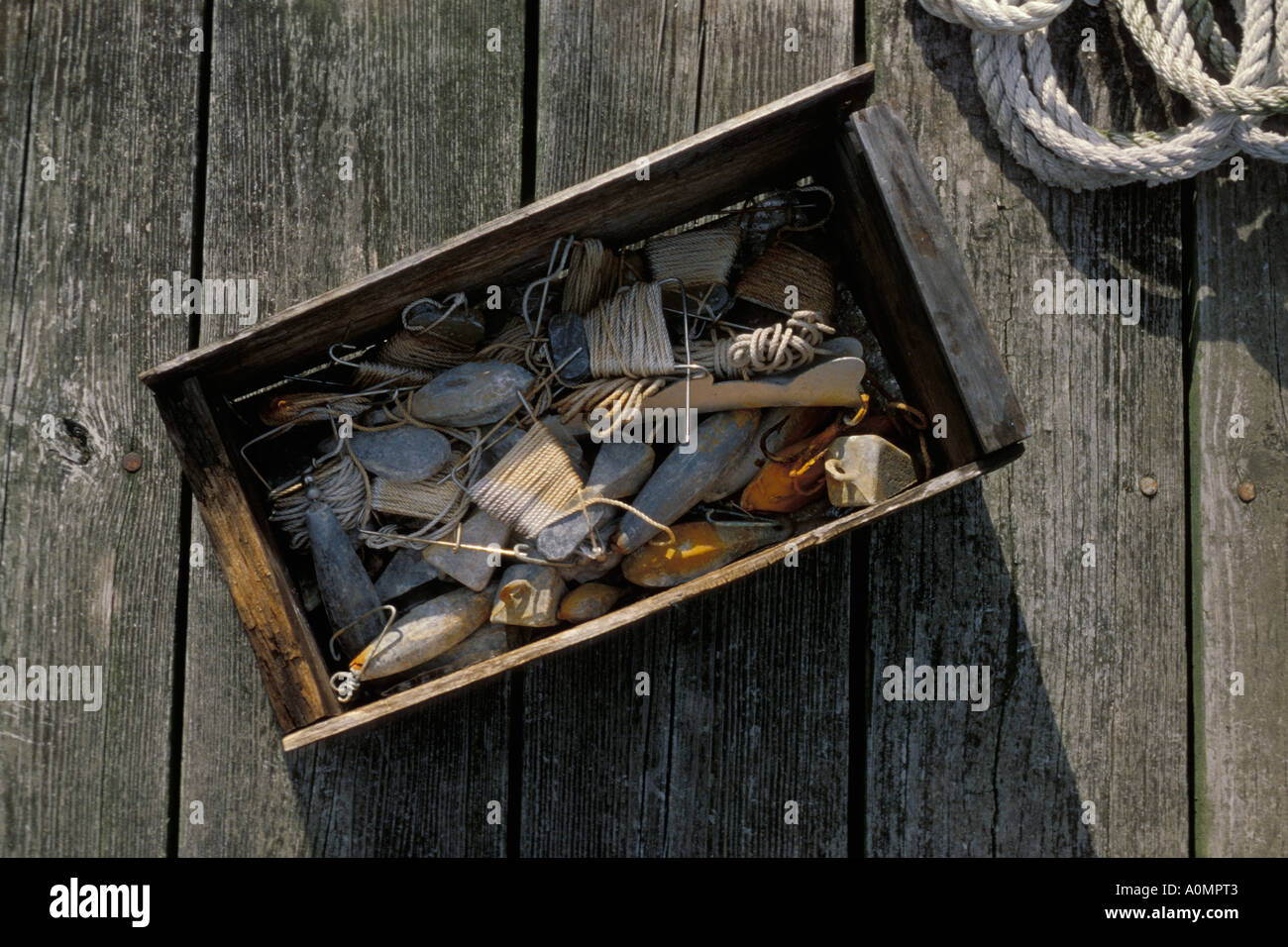 box fishing hand line lead sinkers wooden deck Stock Photo - Alamy