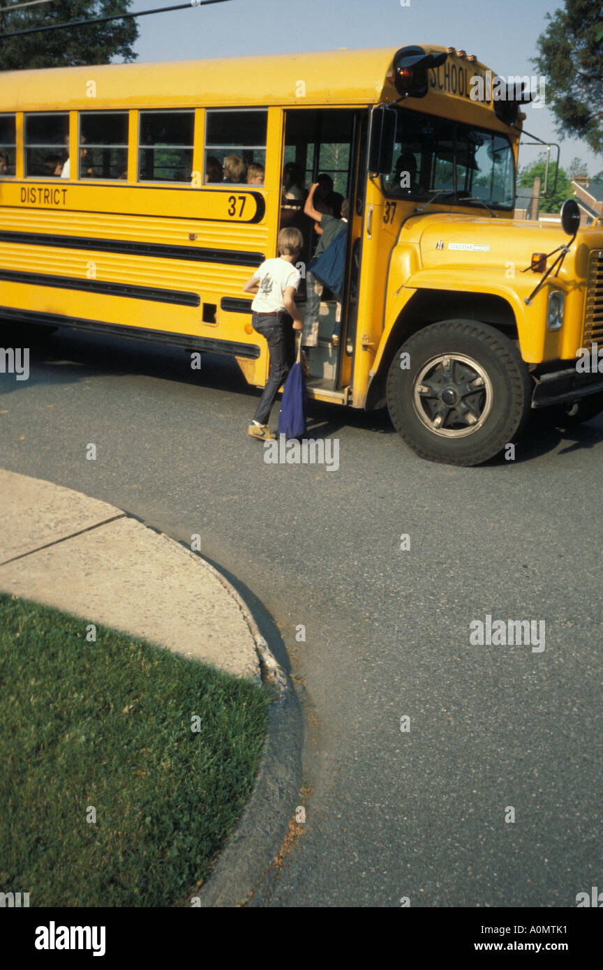 yellow school bus boarding early morning Stock Photo