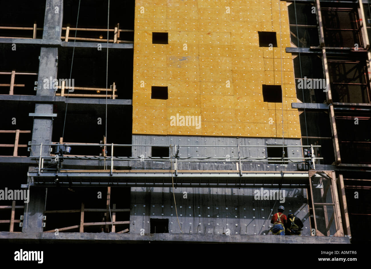 commercial building under construction steel beam masonry siding