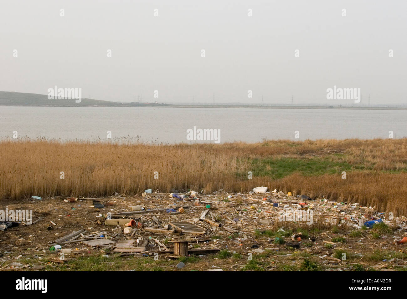 Litter left at high tide by the River Thames at Crayford Ness, Kent