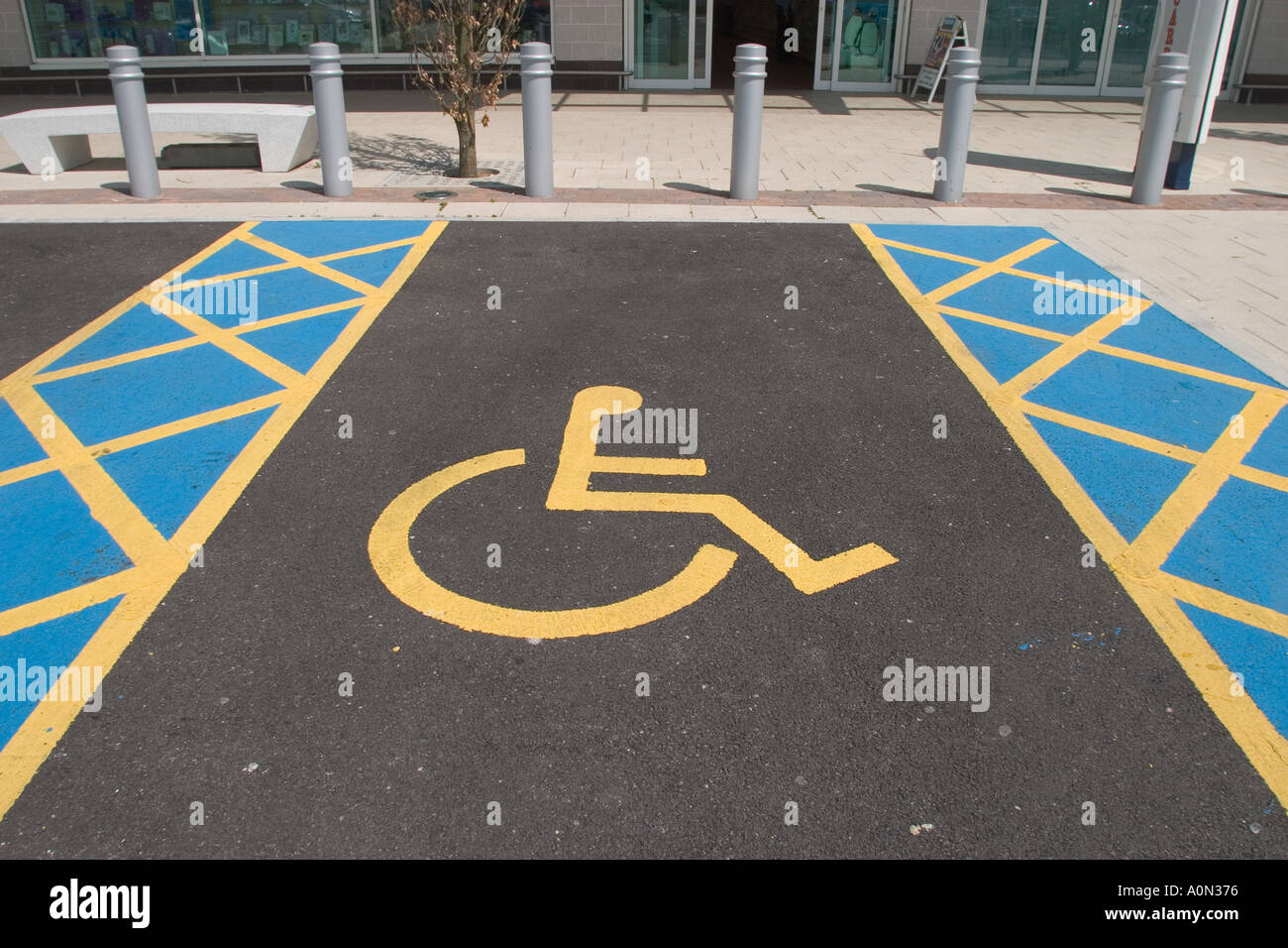 Wheel chair sign in disabled parking bay at Beckton East London Stock
