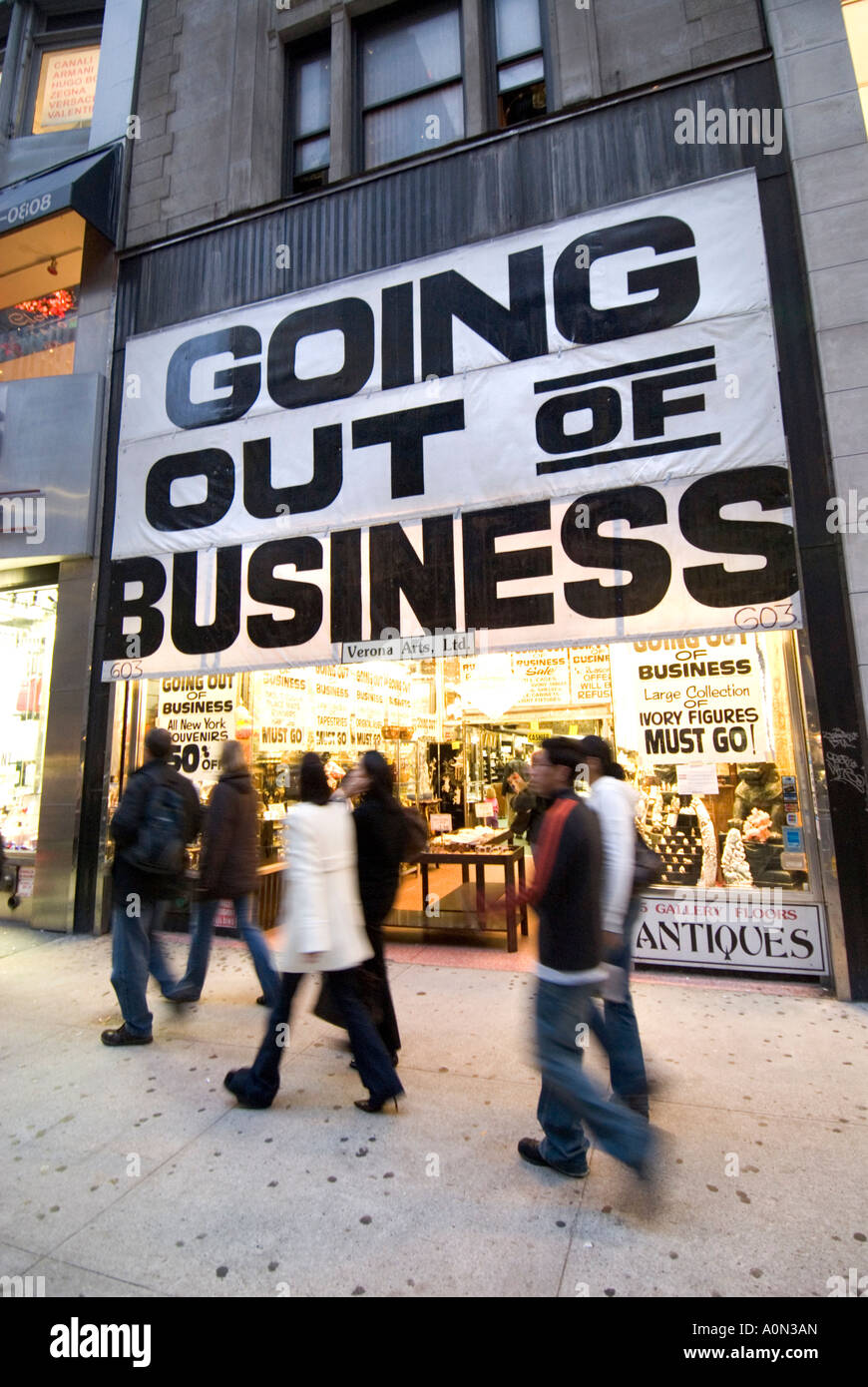 Shop with GOING OUT OF BUSINESS sign on 5th avenue Midtown Manhattan New York USA Stock Photo