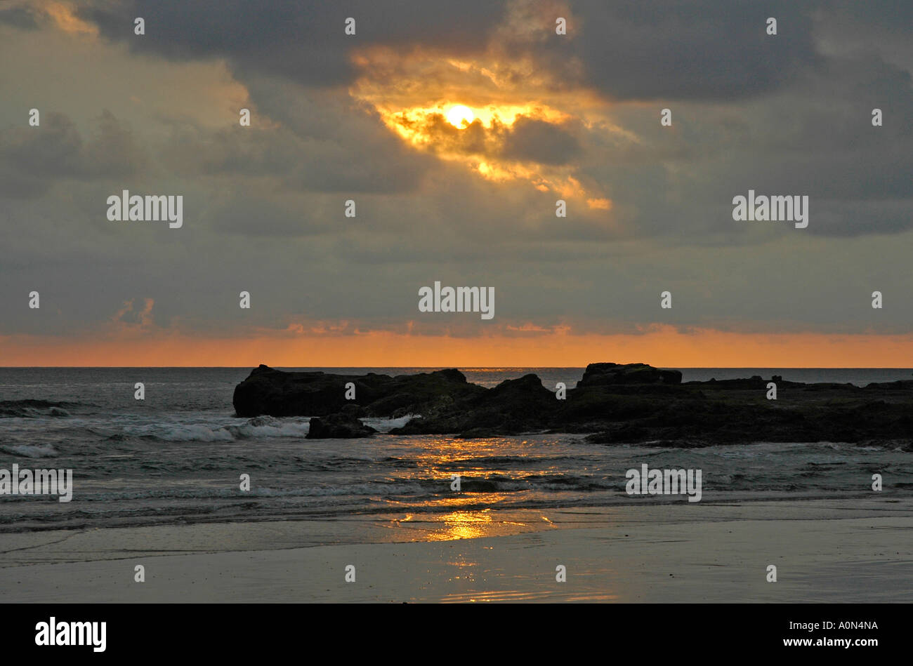 Tropical sunset sky pink costa rica hi-res stock photography and images