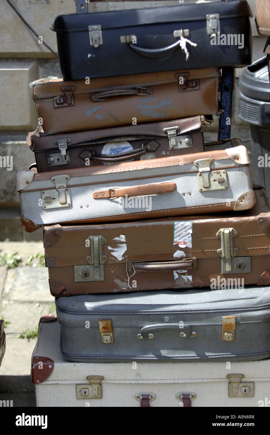 retro vintage suitcases stacked stack pile collection baggage luggage concept old plain brown grey boring musty dusty outdated Stock Photo Alamy